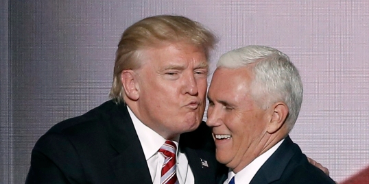 Republican U.S. presidential nominee Donald Trump greets vice presidential nominee Mike Pence after Pence spoke at the Republican National Convention in Cleveland